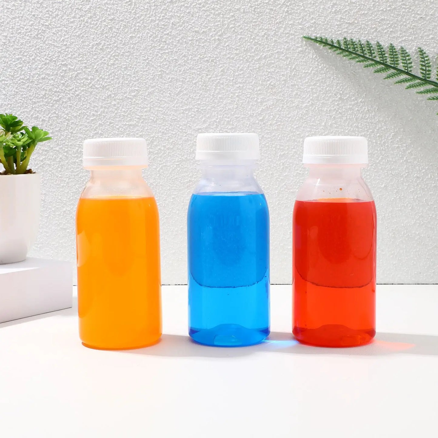 Lot de 10 Bouteilles en Plastique Transparentes (200/250/300/350ml)