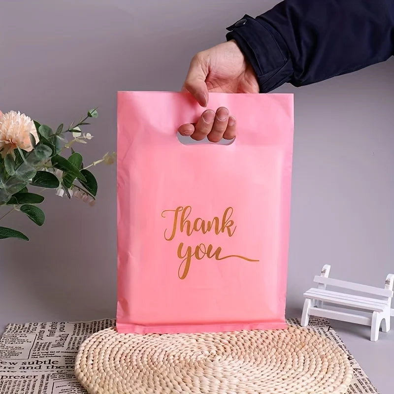 Lot de 50 ou 100 sacs cadeaux.