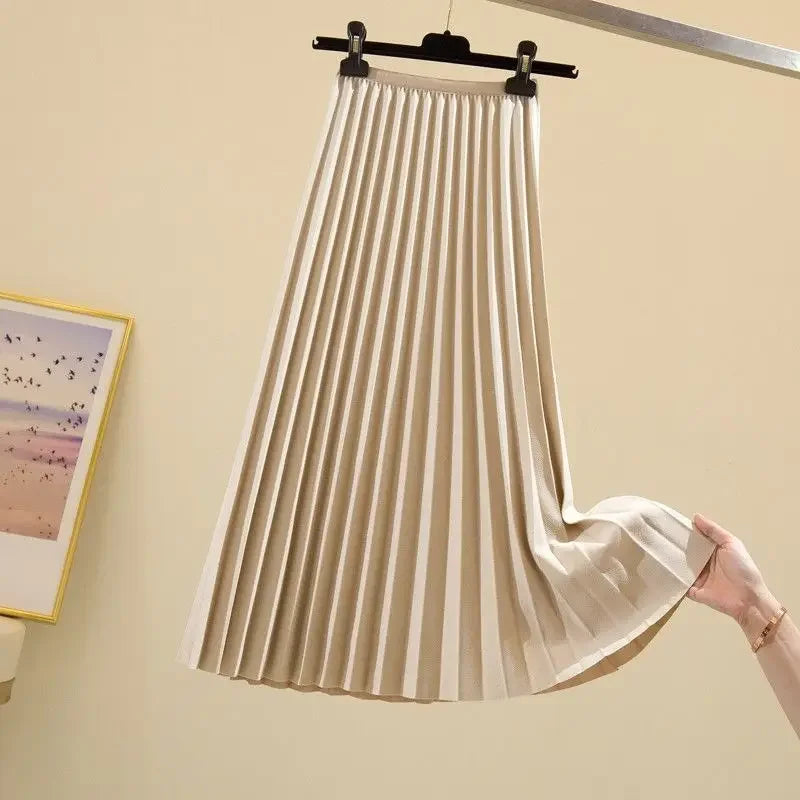 Jupe évasée taille haute, plissée.